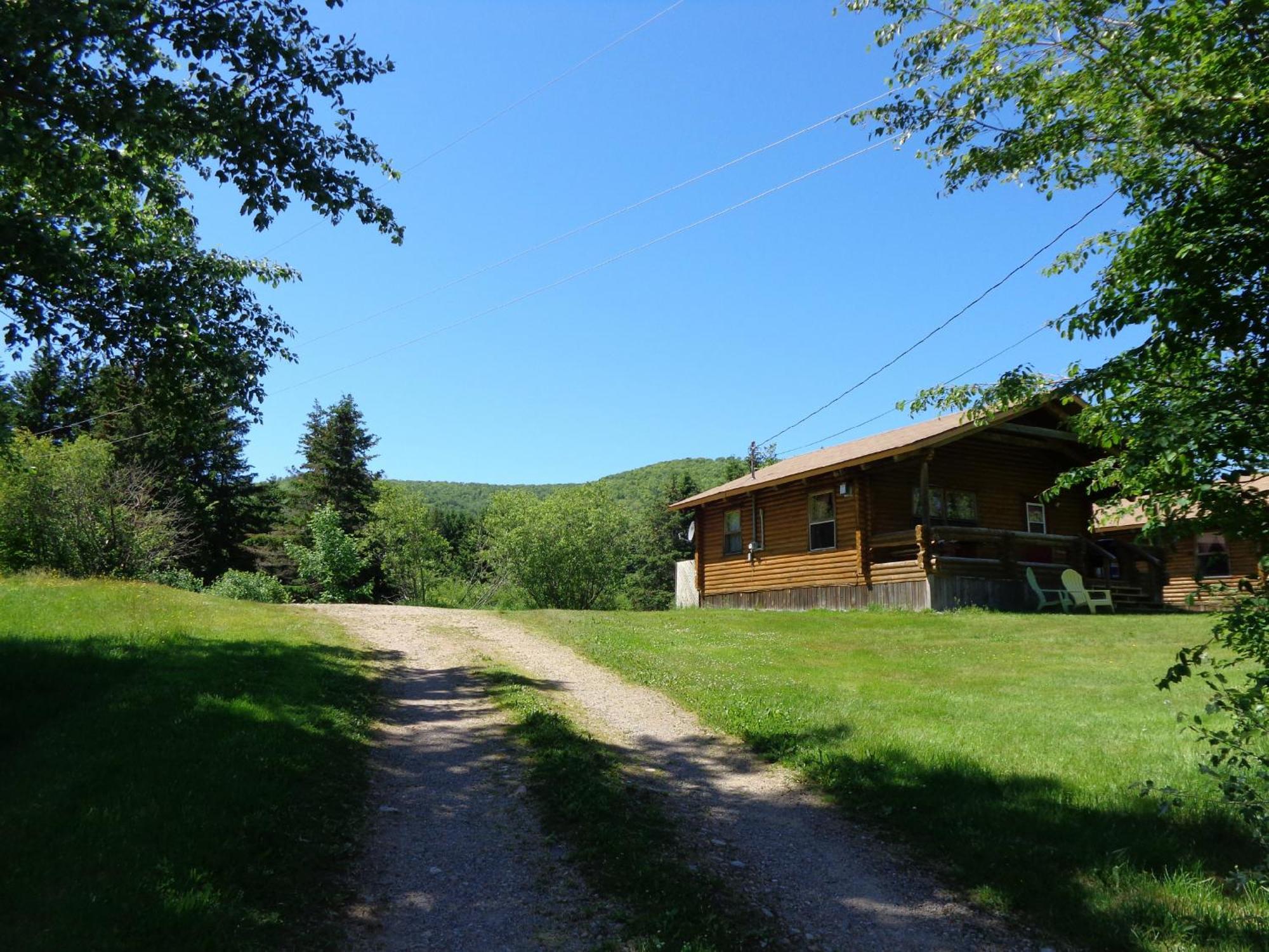 Cajun Cedar Log Cottages Margaree Forks Ruang foto